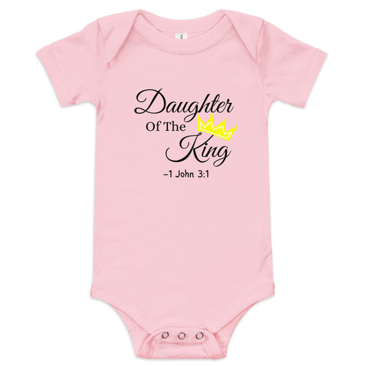 Front view of pink Christian newborn onesie – Daughter of the King design with crown and Bible verse