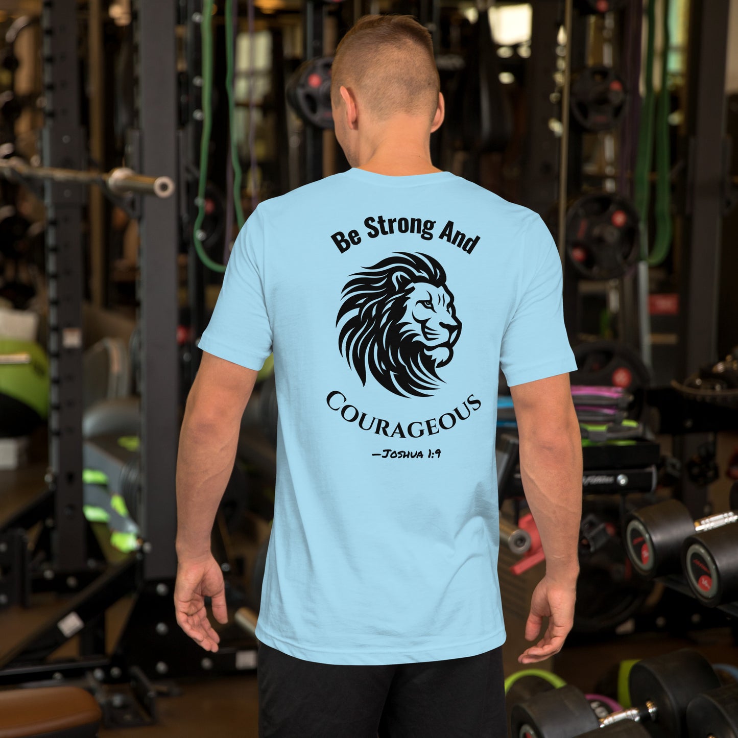 Back of light blue Christian t-shirt with lion head and Joshua 1:9 Bible verse – “Be Strong and Courageous”