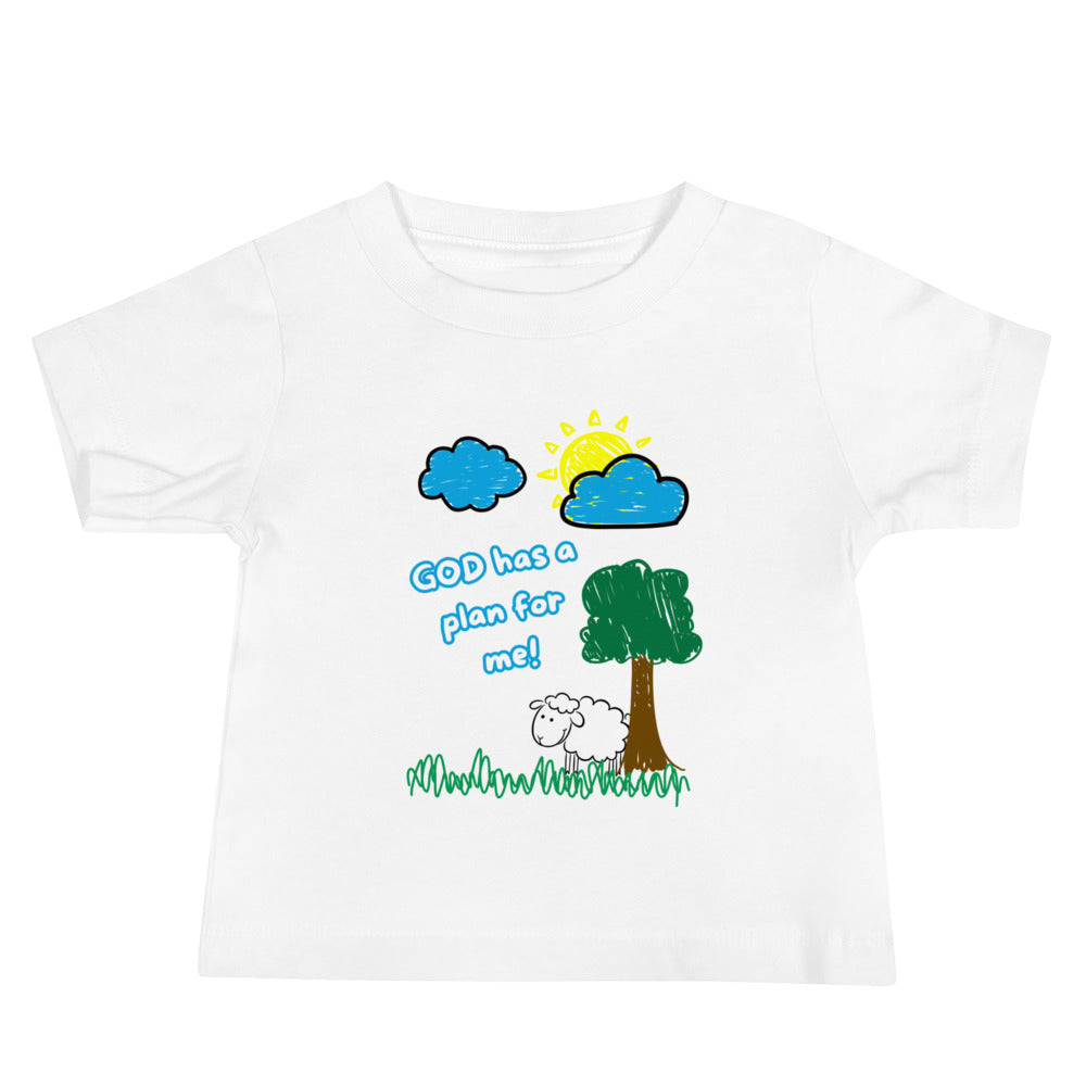 Front view of white baby shirt with blue text "God has a plan for me" and a graphic of a sheep in a grassy field with tree, clouds, and sun
