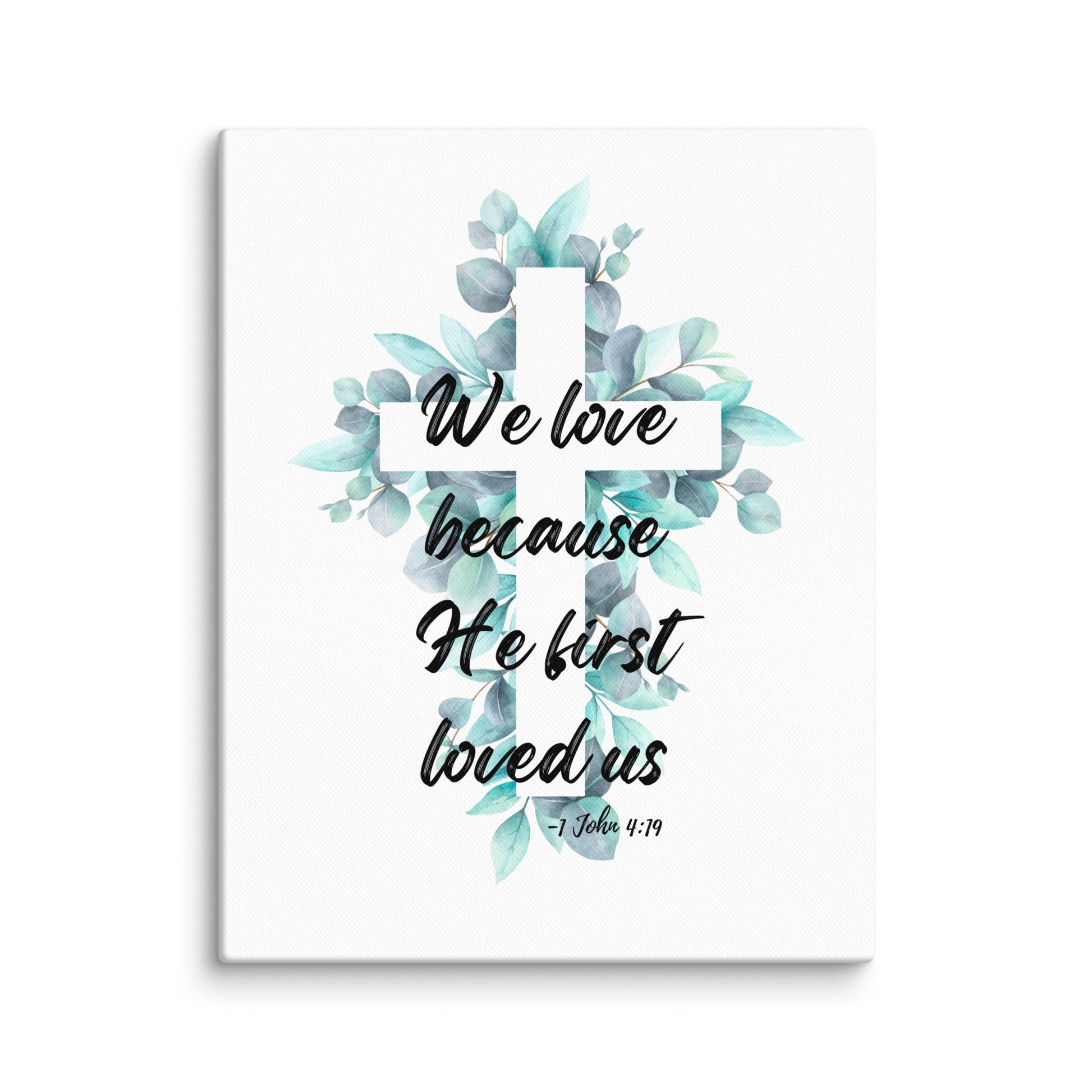 11x14 canvas art print featuring a delicate watercolor cross outline surrounded by soft floral accents, inspired by 1 John 4:19.