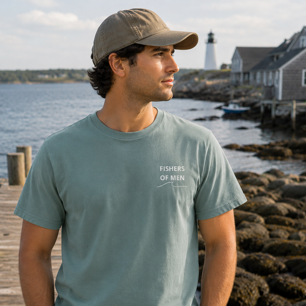 Man wearing the Fishers of Men Tee in Green Bay featuring the Fishers of Men chest design inspired by Matthew 4:19.