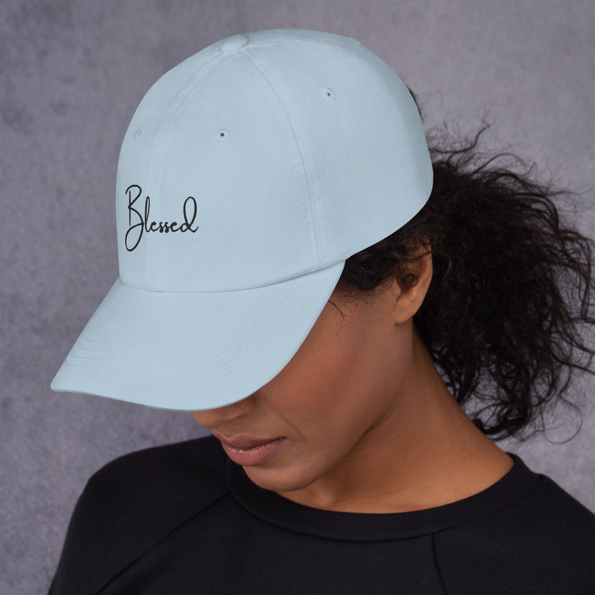 Product mockupLight Blue Blessed Hat front and side view on female model