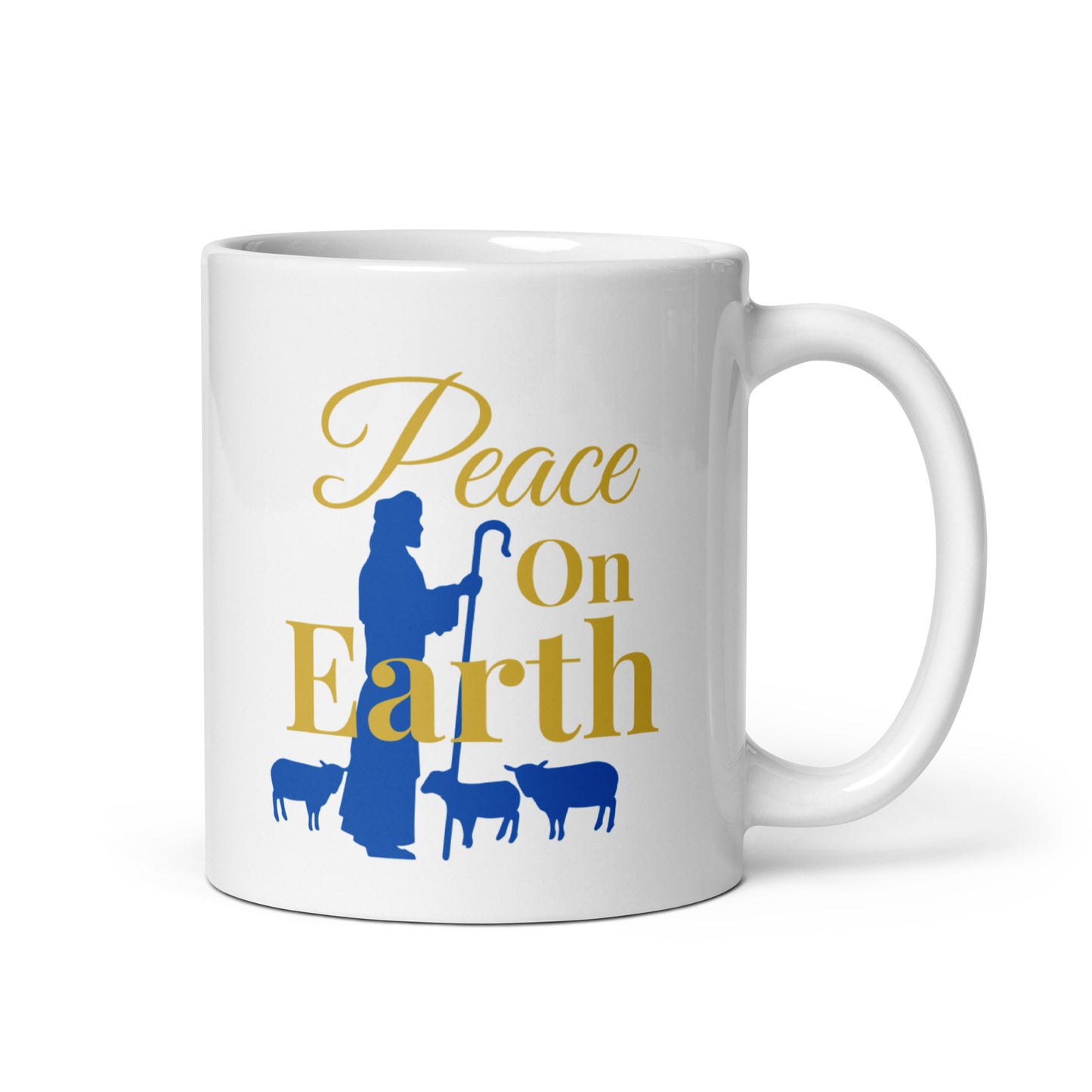 White mug with 'Peace On Earth' text and shepherd silhouette on a white background