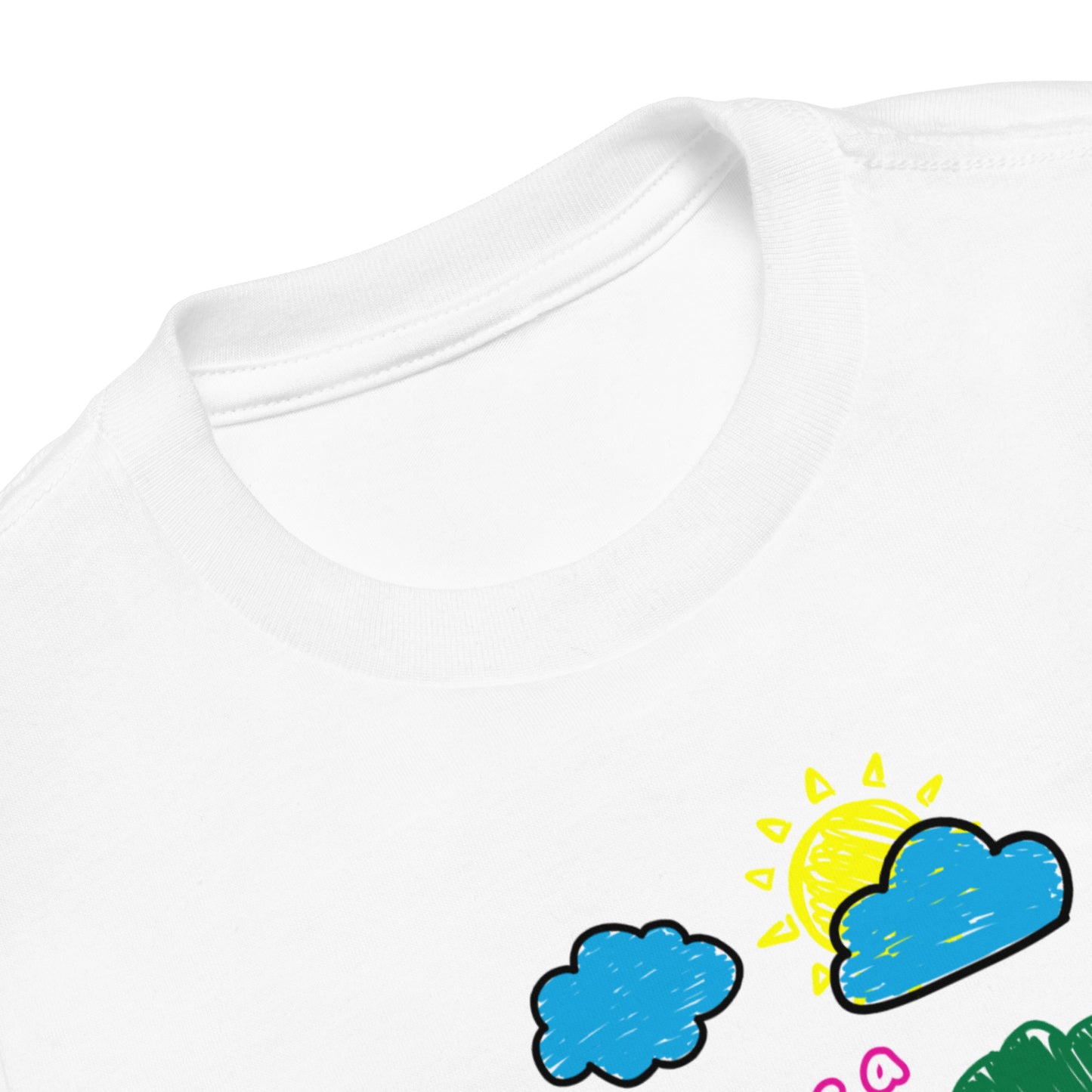 Close-up of toddler girl’s Christian shirt showing the collar and top third of the design with pink text “God Has a Plan for Me” and partial sheep graphic
