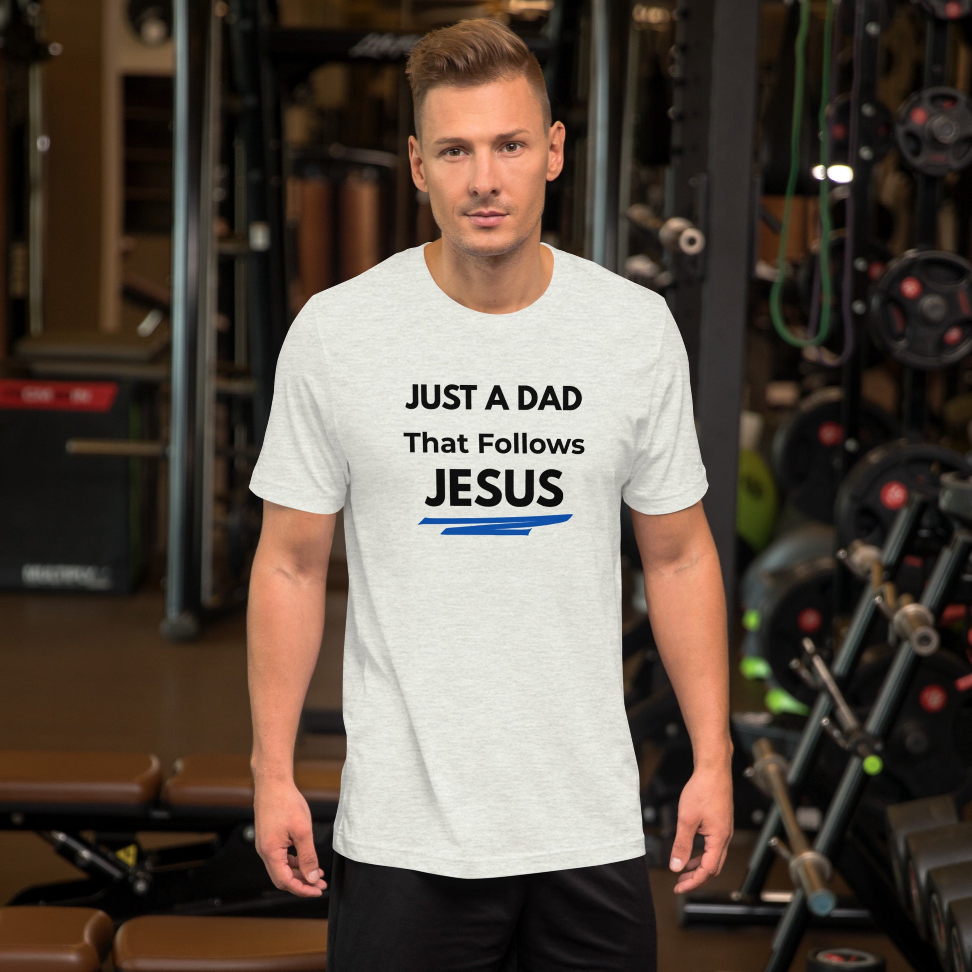 Front of Christian dad grey t-shirt reading “Just a Dad That Follows Jesus” – faith-based shirt for Father’s Day