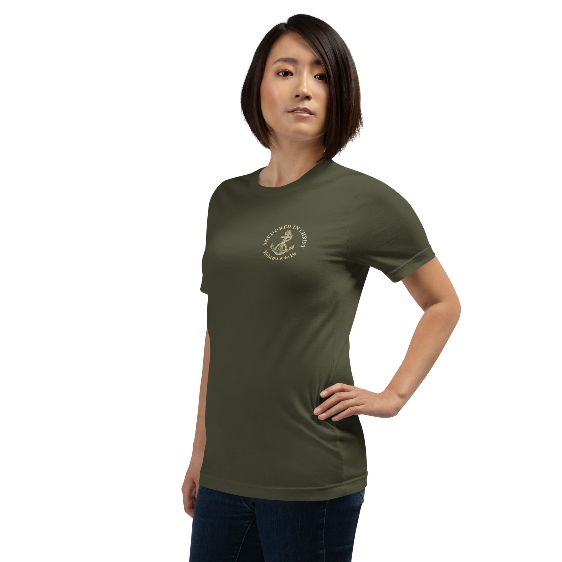 Woman wearing Anchored in Christ Field Edition shirt, front view in military green