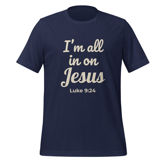 Front view of navy blue Christian t-shirt with “I’m All In on Jesus” printed in cream and Luke 9:24 scripture reference
