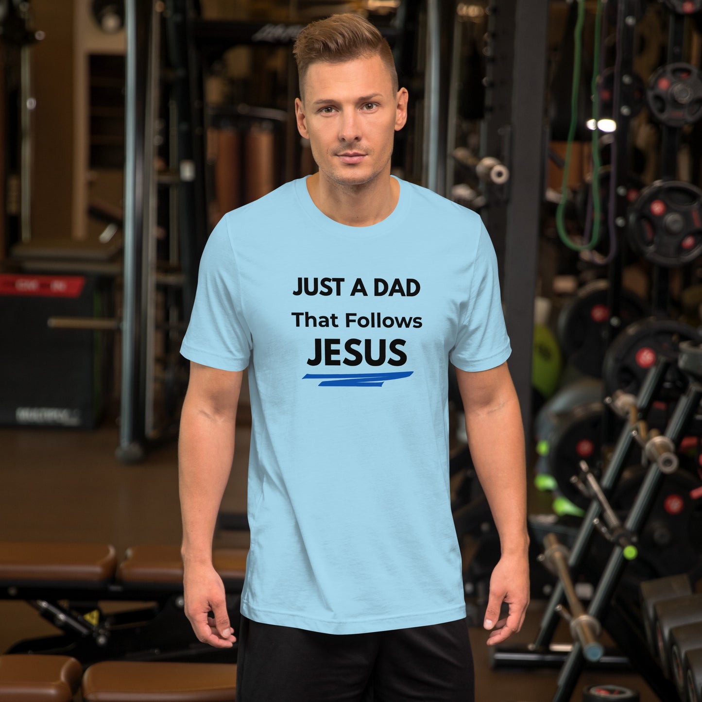 Front of Christian dad light blue t-shirt reading “Just a Dad That Follows Jesus” – faith-based shirt for Father’s Day