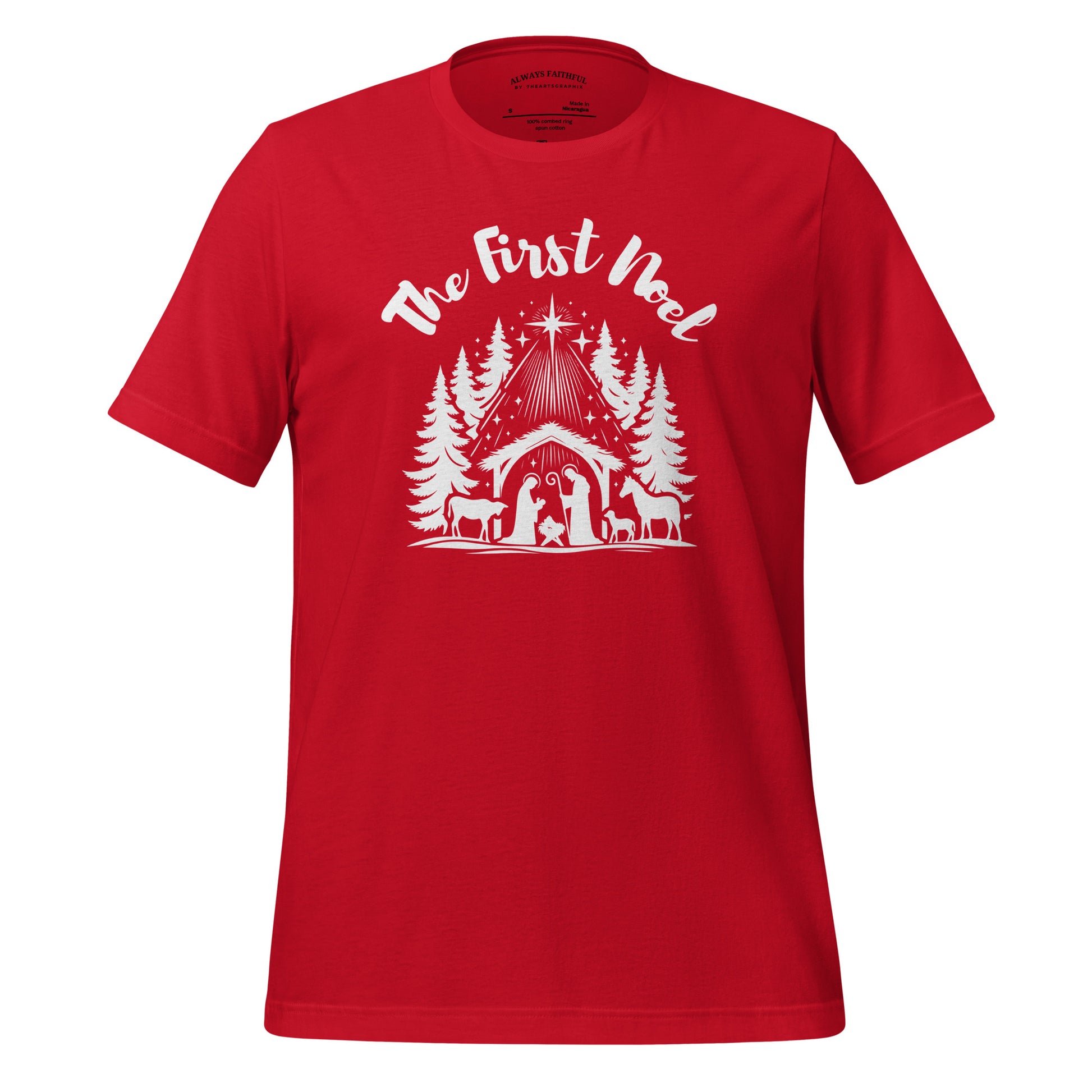 Front view of the red First Noel Tee with white text across the chest and a nativity graphic below, featuring the manger, Christmas star, and pine trees.
