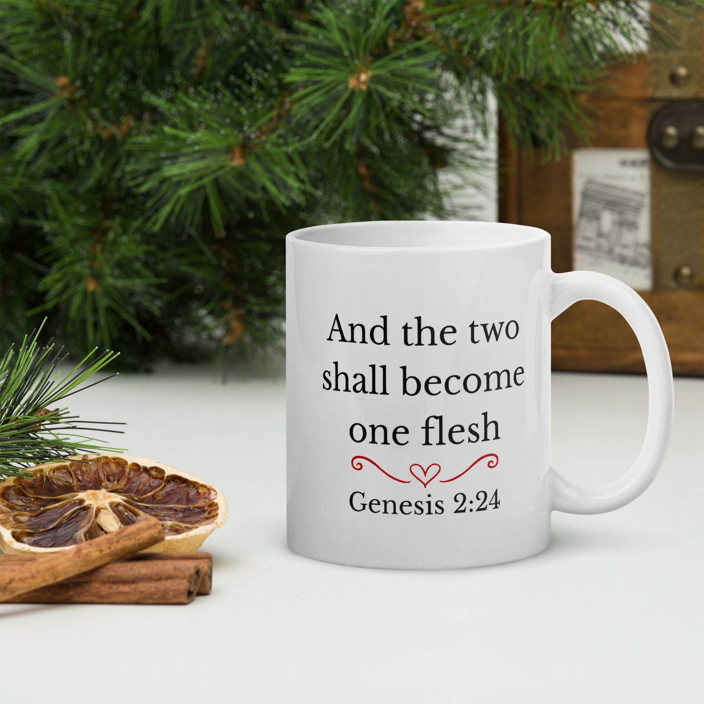 Bible verse mug back view featuring Genesis 2:24 scripture with Christmas background