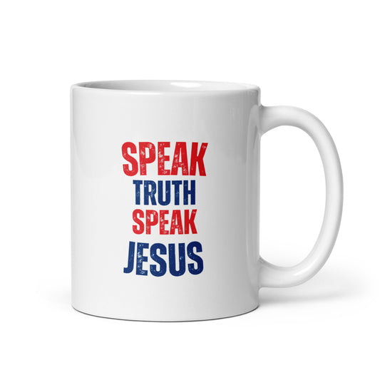 White mug with stacked red and blue typography reading "Speak Truth, Speak Jesus," front view, Charlie Kirk inspired.  TPUSA